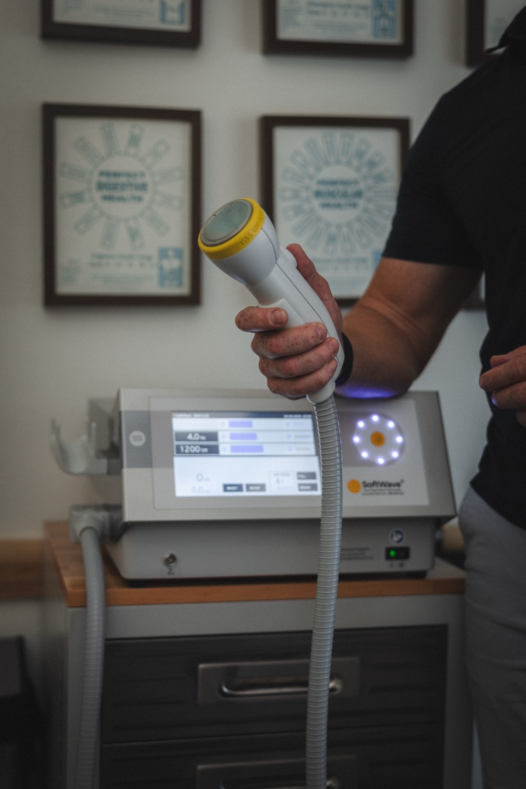 SoftWave therapy applicator hand-piece at Chiro858 in Solana Beach
